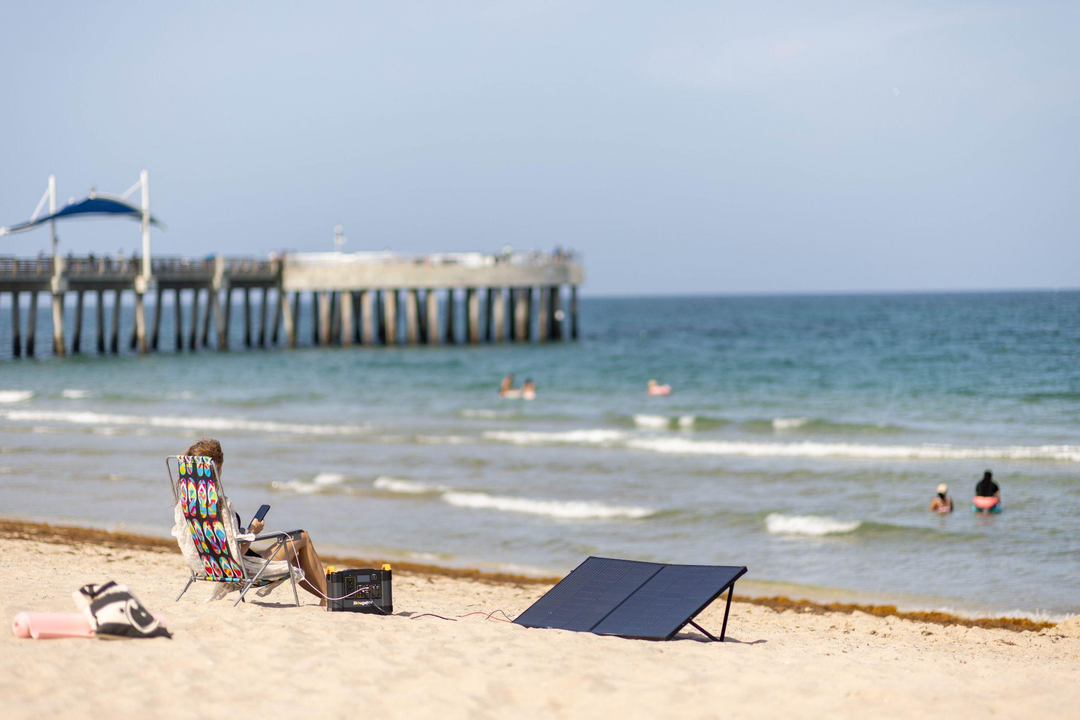 People enjoying the beach with a BoughRV solar panel set
