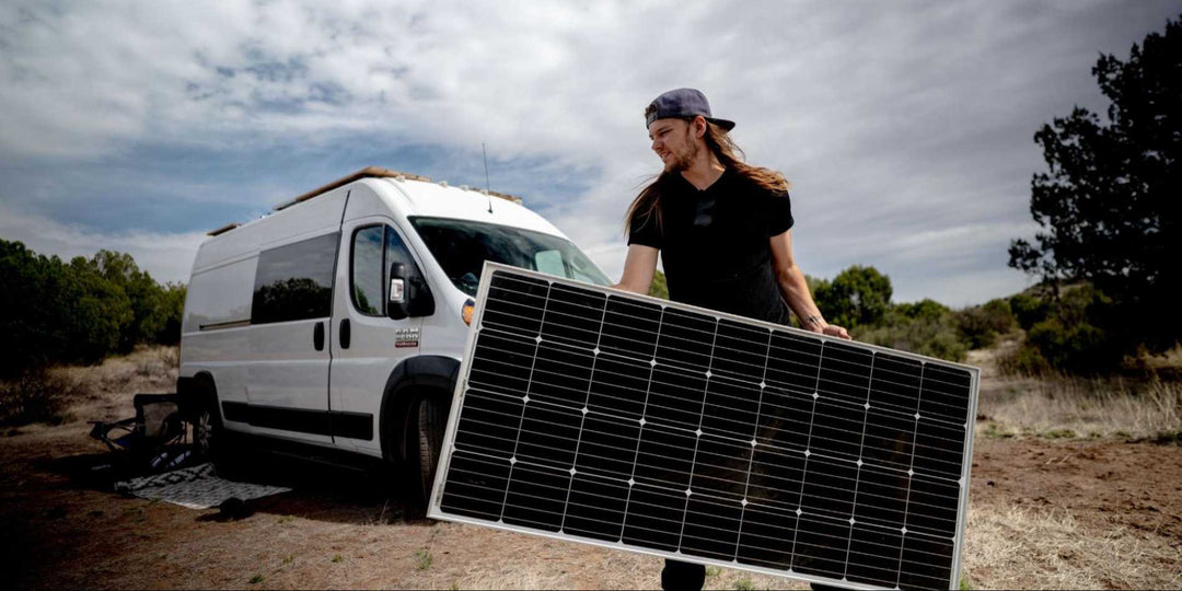A man carrying a BougeRV’s Monocrystalline solar panel