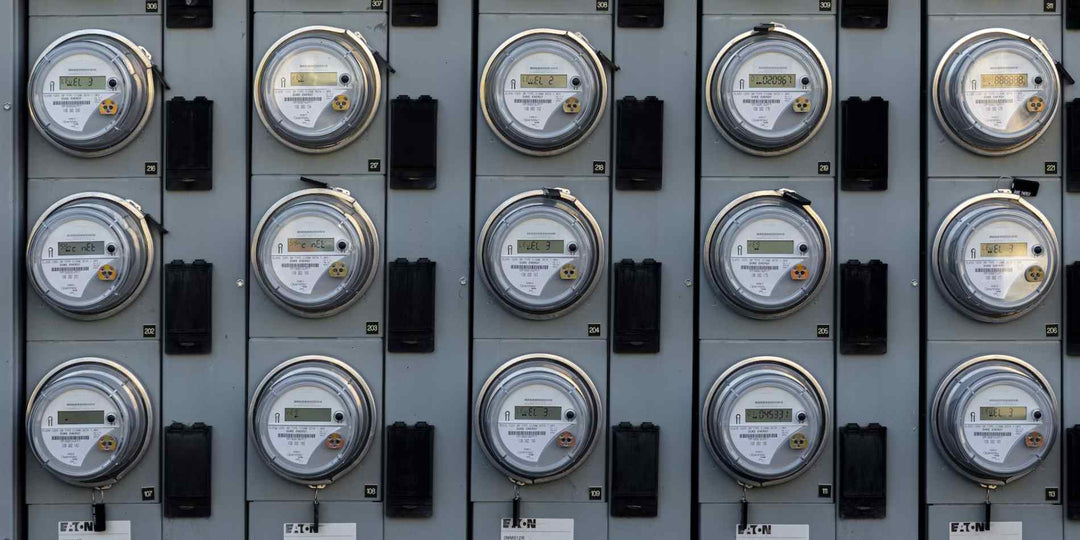Utility meters showing kWh consumption