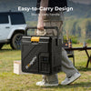 Person carrying a black and yellow 12v portable fridge with &